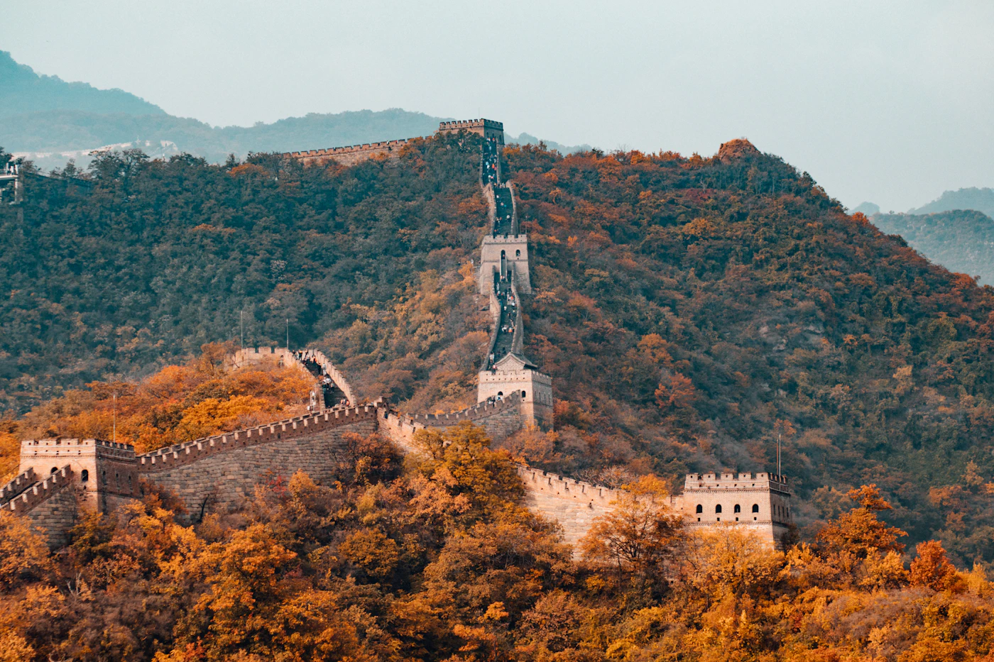 The Great Wall winding over autumn mountain ridges