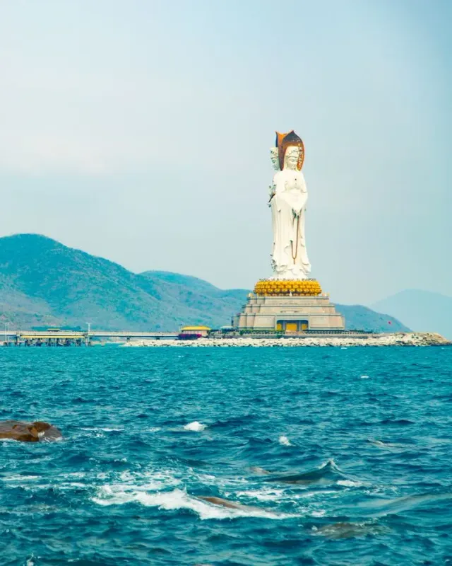 The white Guanyin of Nanshan statue standing above the sea off Sanya, Hainan
