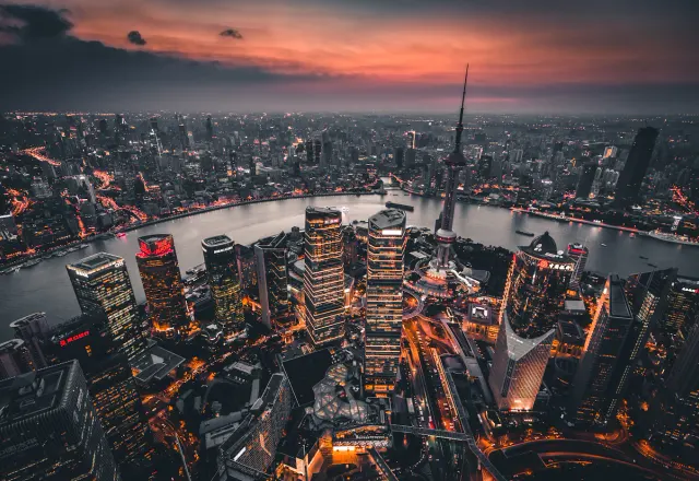 The Oriental Pearl Tower and Pudong skyline beside the Huangpu River in Shanghai