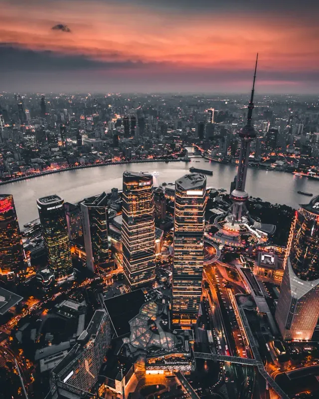 The Oriental Pearl Tower and Pudong skyline beside the Huangpu River in Shanghai