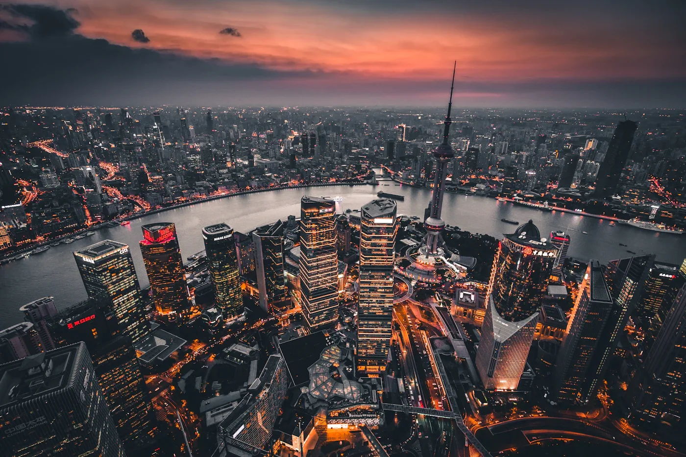 The Oriental Pearl Tower and Pudong skyline beside the Huangpu River in Shanghai